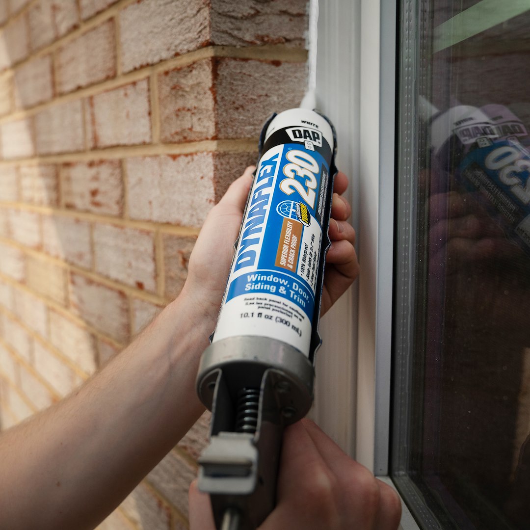 DAP Dynaflex 230 10.1 Ounce White Paste Caulk Sealant (7079818275)