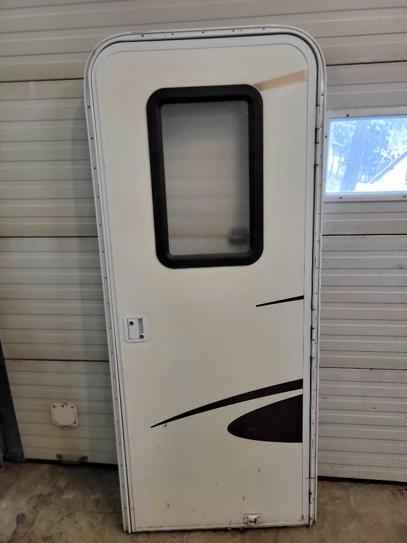 Radius RV Entrance Door with Screen Frame and Key - Used RV Parts