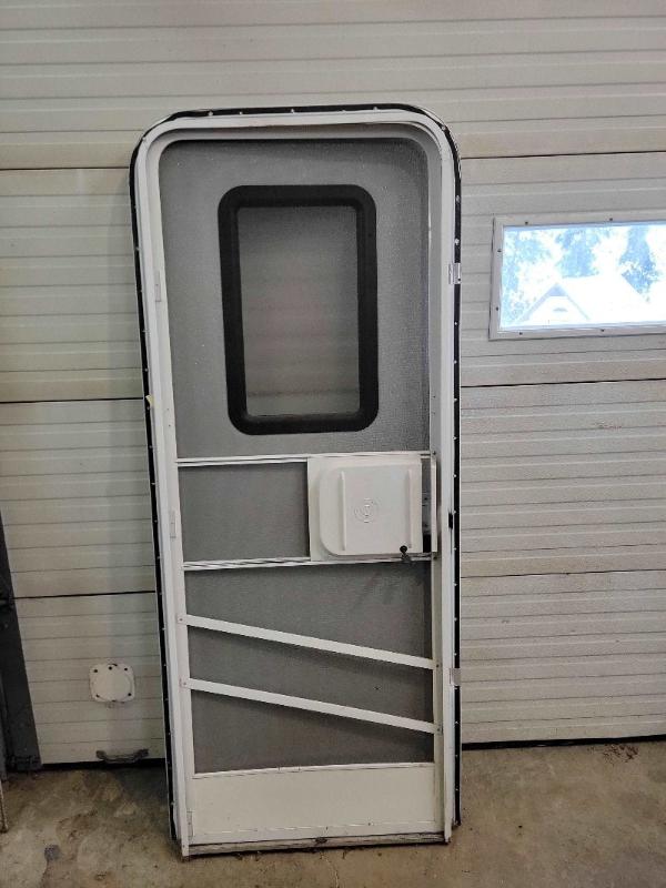 Radius RV Entrance Door with Screen Frame and Key - Used RV Parts