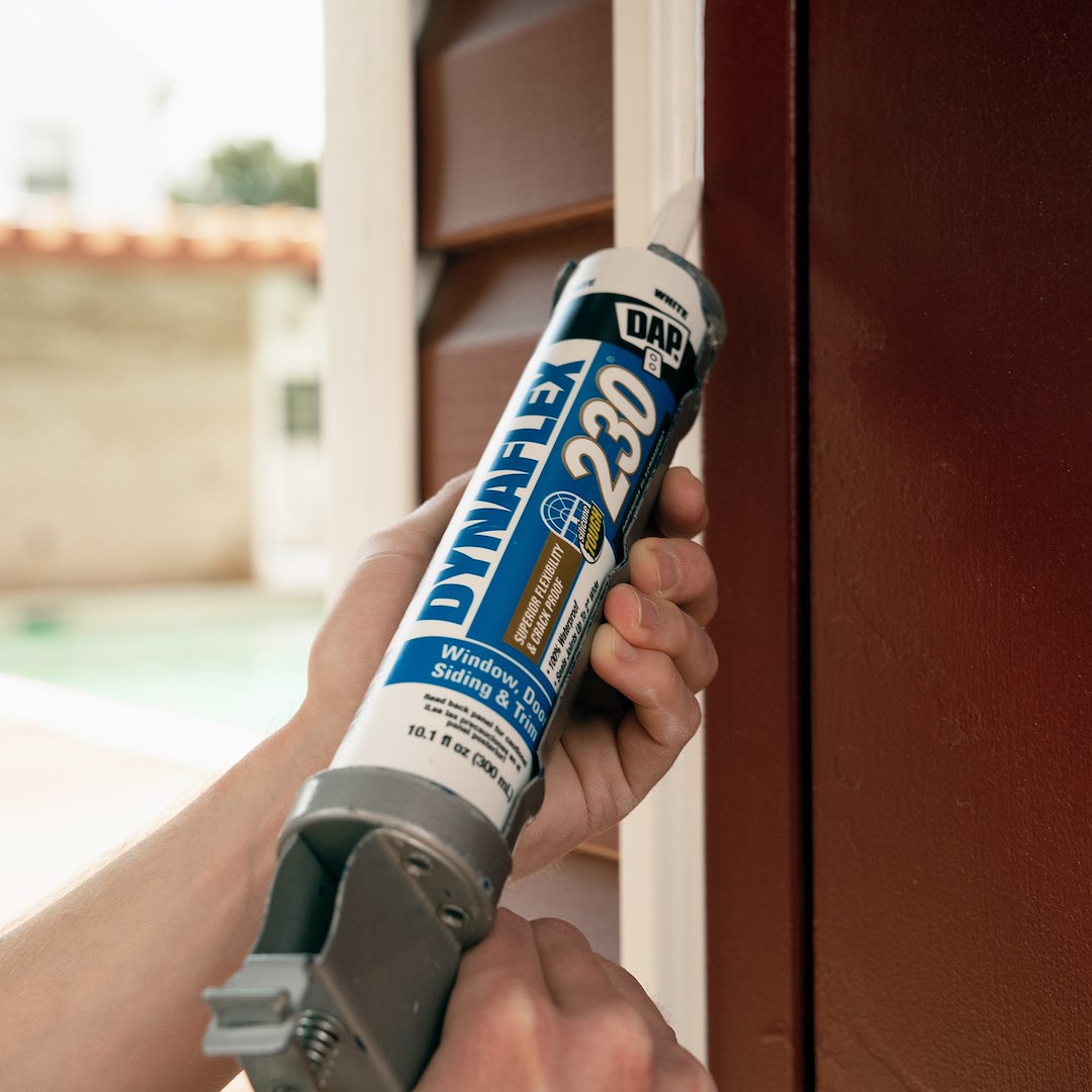 DAP Dynaflex 230 10.1 Ounce White Paste Caulk Sealant (7079818275)