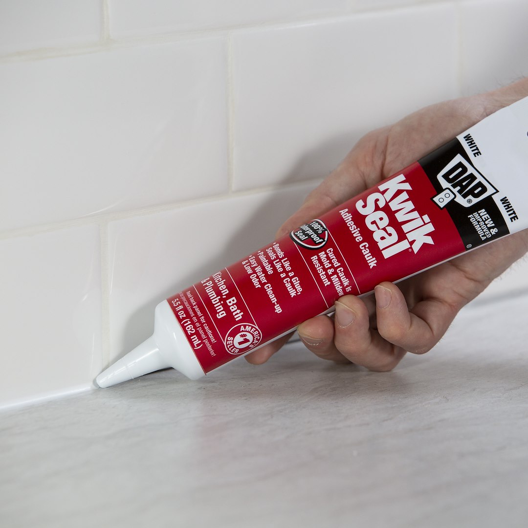 DAP Kwik Seal 5.5 Ounce White Paste Caulk Sealant (7079818001)